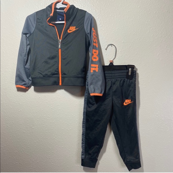 grey and orange nike tracksuit